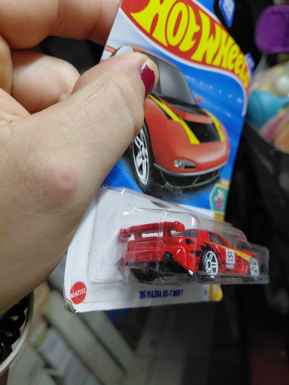 the Hot Wheels '95 Mazda RX-7 Drift from the 2025 '70s vs '90s series (9/10, num